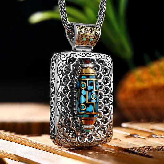 Gemme porte-bonheur et protectrice : pendentif Dzi turquoise à neuf yeux 